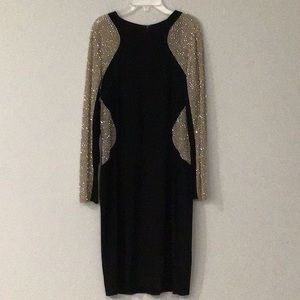 Black cocktail dress, sheer long sleeve with silver studs